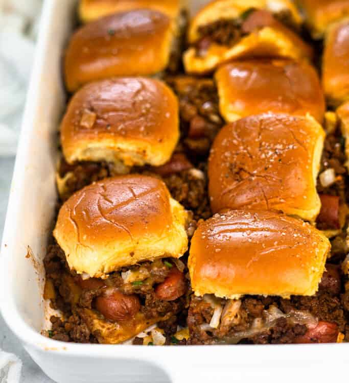 Chili Cheese Dog Sliders in a baking dish.