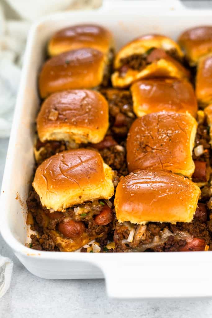 Chili Cheese Dog Sliders in a baking dish.