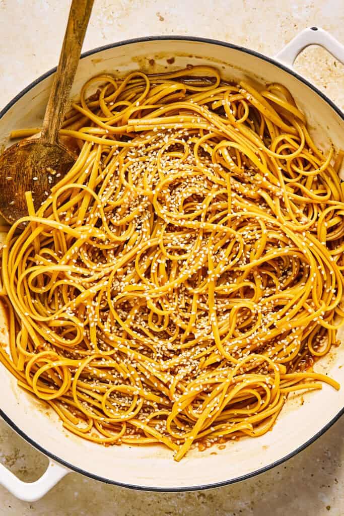 Hibachi Noodles topped with sesame seeds in a pot.