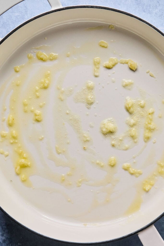 Butter and garlic in a skillet.