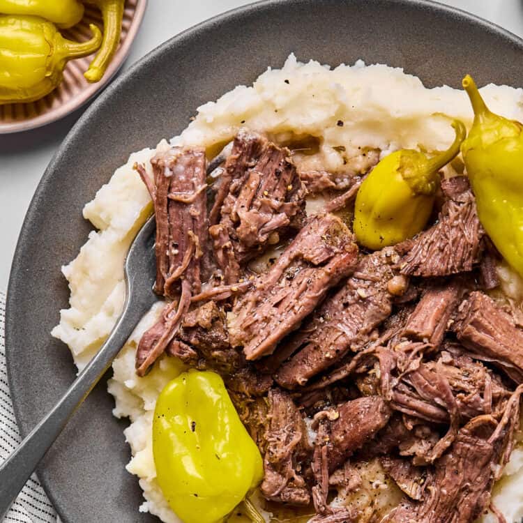 Mississippi Pot Roast with garlic mashed potatoes on a plate.