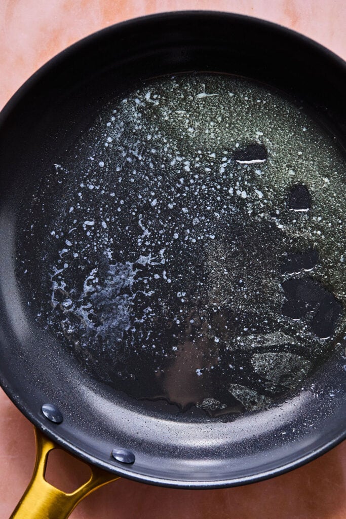 Melted butter in a skillet.