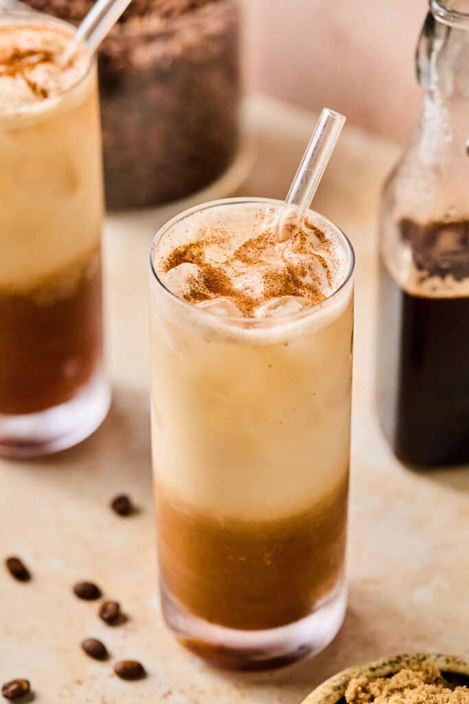 Iced Brown Sugar Shaken Espresso in a glass with a straw.