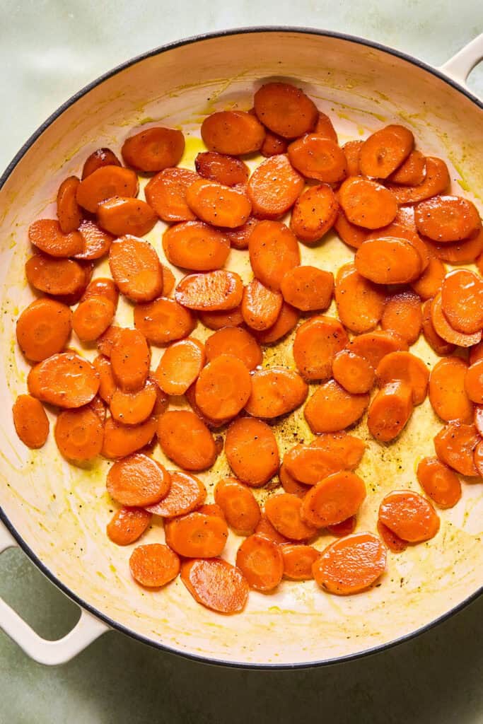 Cooked Honey Glazed Carrots in a skillet.