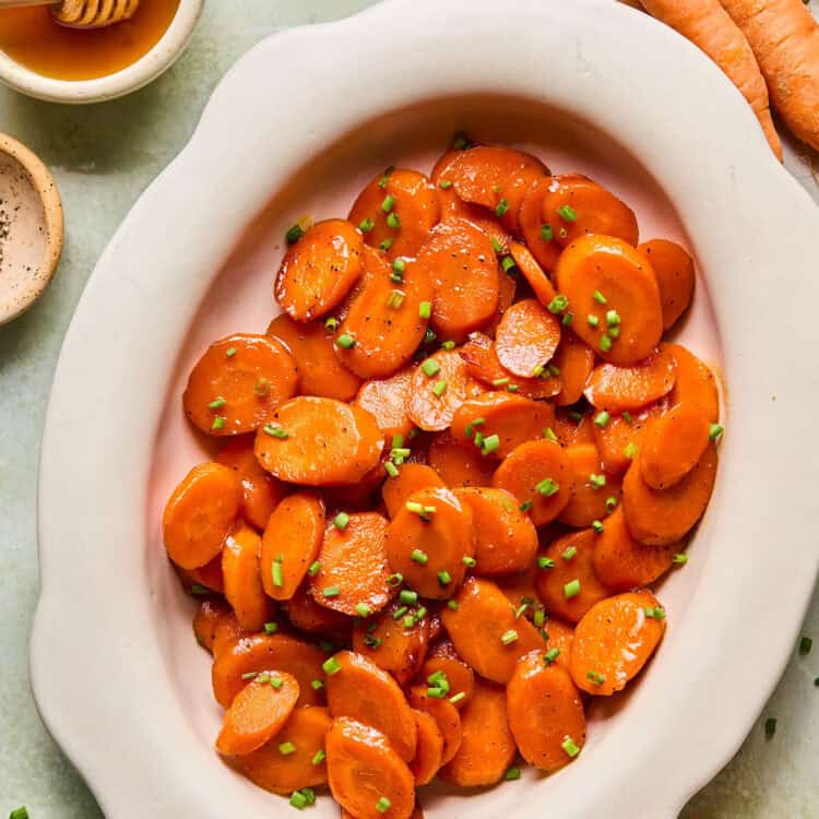 Honey Glazed Carrots in an oval serving dish.