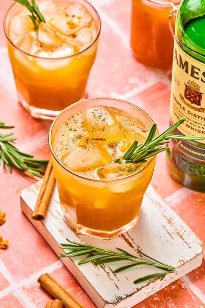 Smashing Pumpkin Cocktail garished with rosemary.