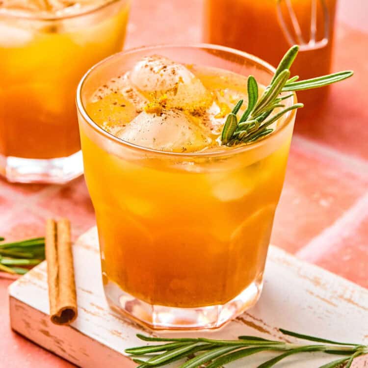 Smashing Pumpkin Cocktail garished with rosemary.