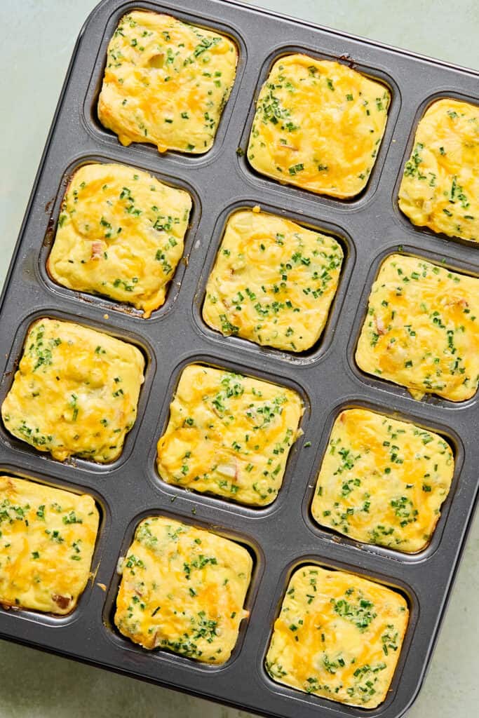 Cheesy Potato Chive Egg Bites in a brownie pan.