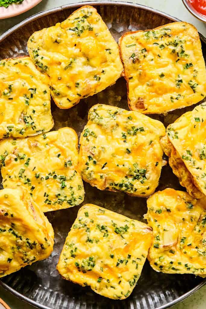 Cheesy Potato Chive Egg Bites on a tray.