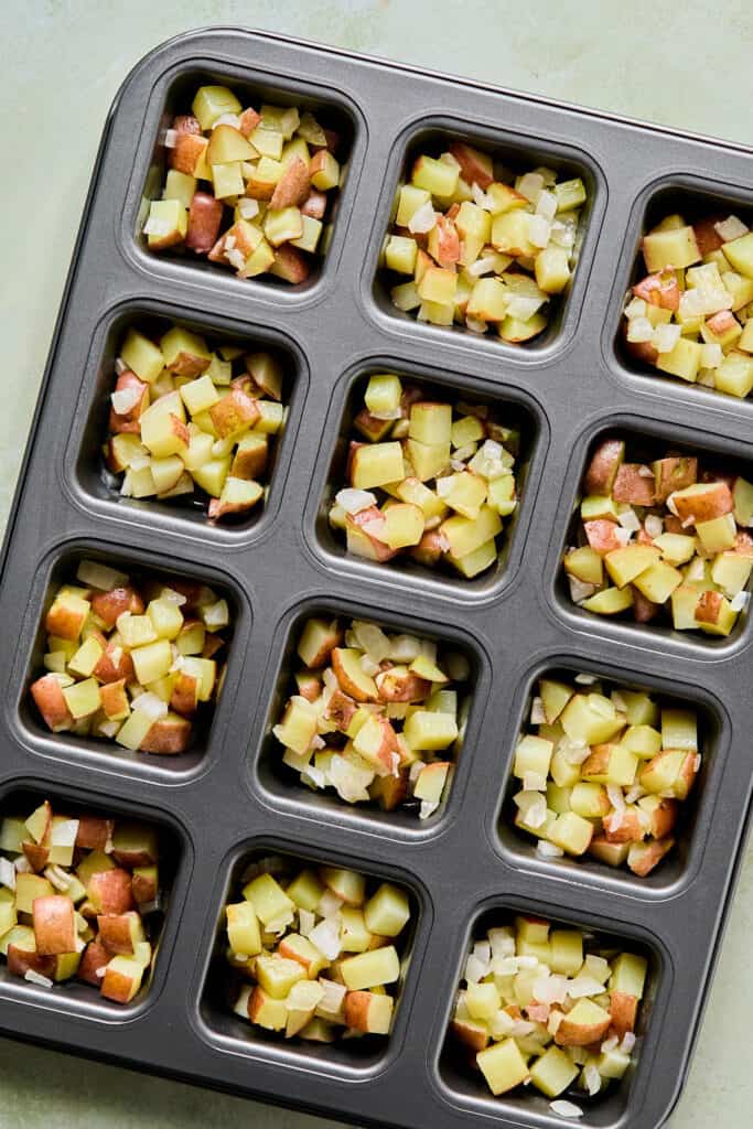 Diced potatoes in a brownie pan.