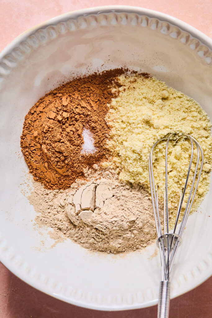 Dry ingredients for Cosmic Brownie Protein Bites in a bowl.