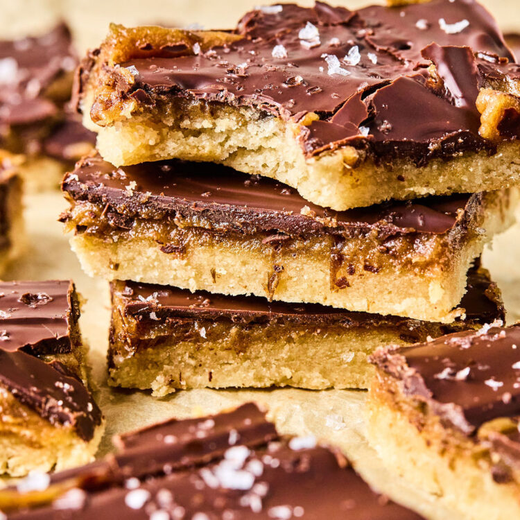 Salted Caramel Date Bars stacked in a pile.
