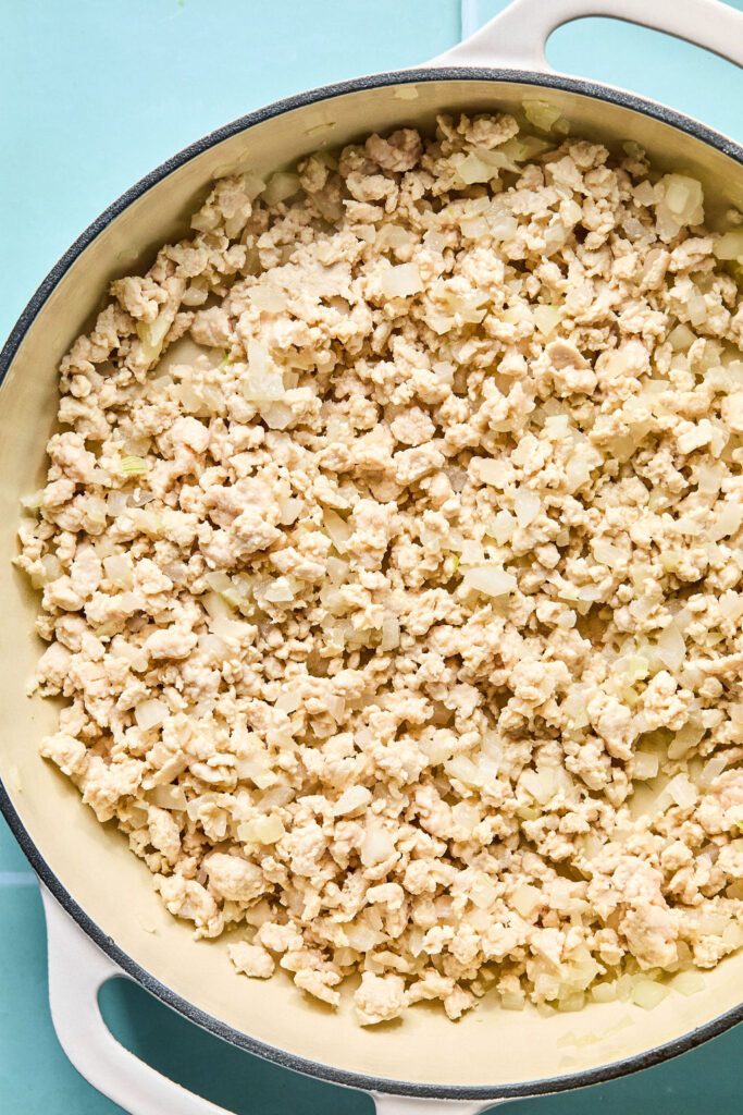 Cooked ground turkey in a skillet.