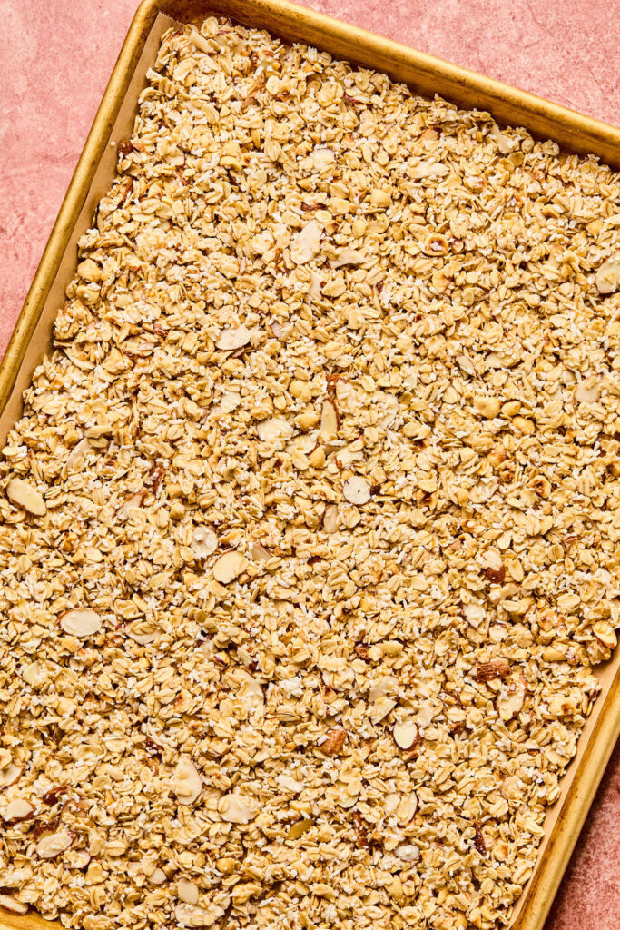 Hazelnut Maple Granola on a sheet pan.