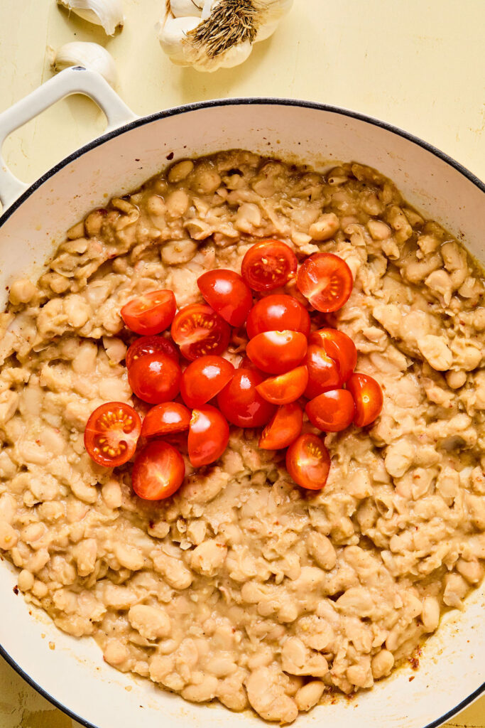 Cherry tomatoes added on top of the beans.