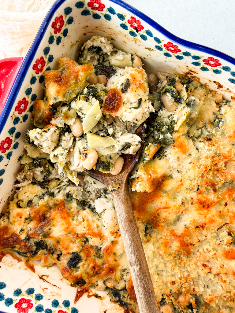 Spinach & Artichoke Chicken White Bean Bake in a baking dish.