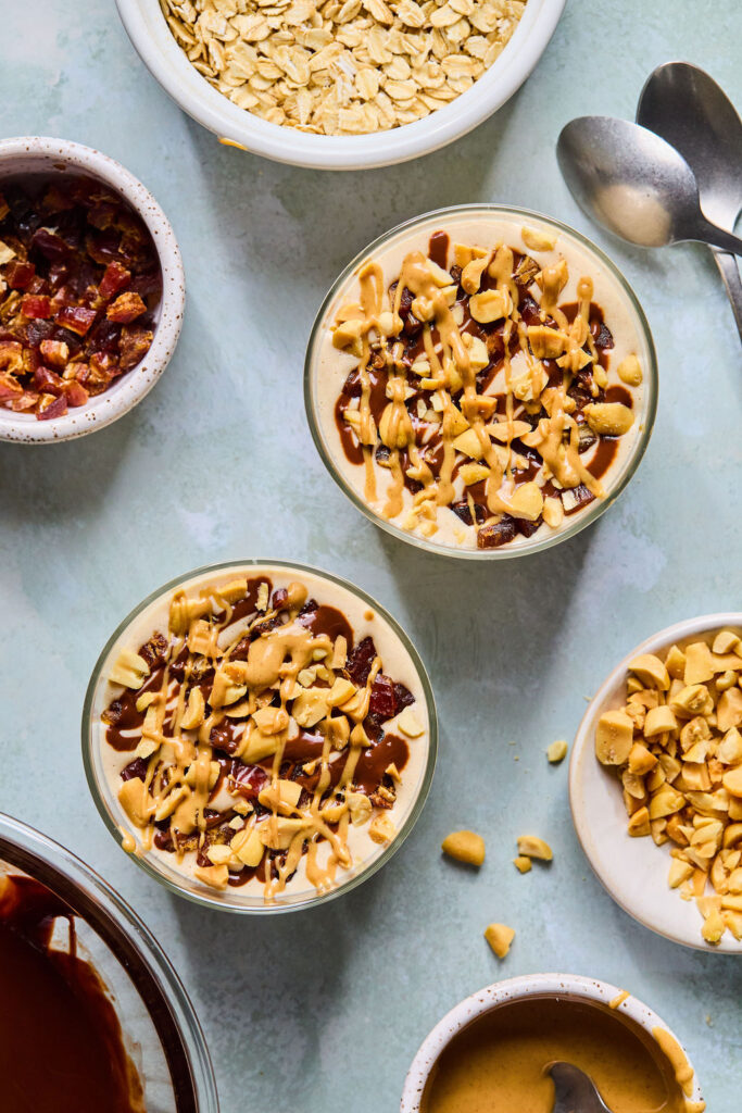 Snickers Blended Overnight Oats in jars.