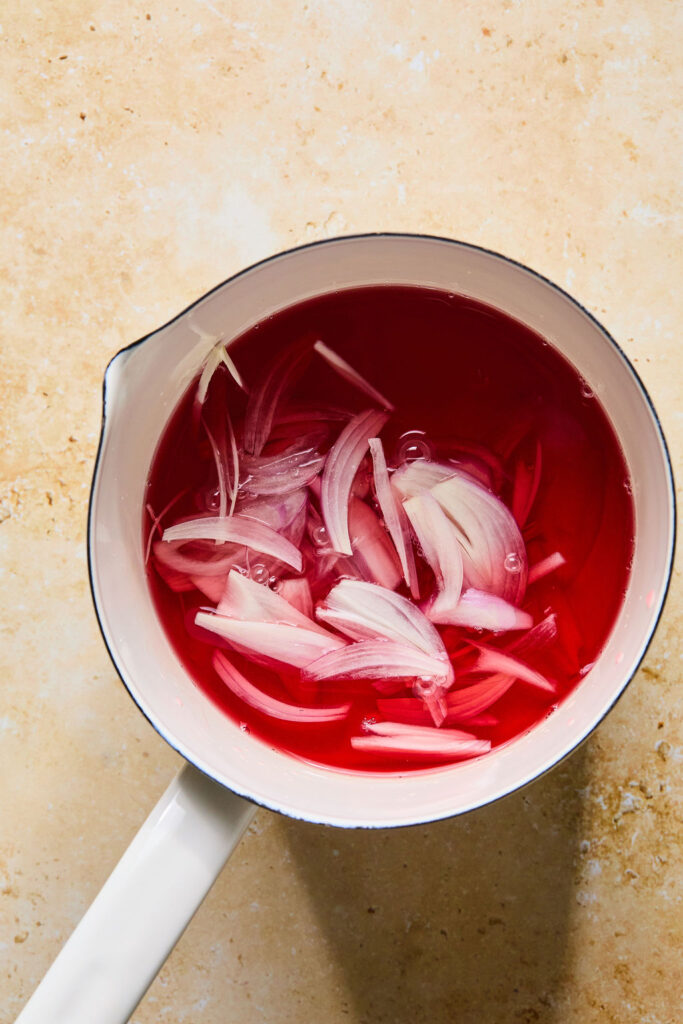 Tomato mixture in a sauce pan.