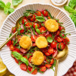 Crispy Goat Cheese & Tomato Salad in a bowl with a fork.