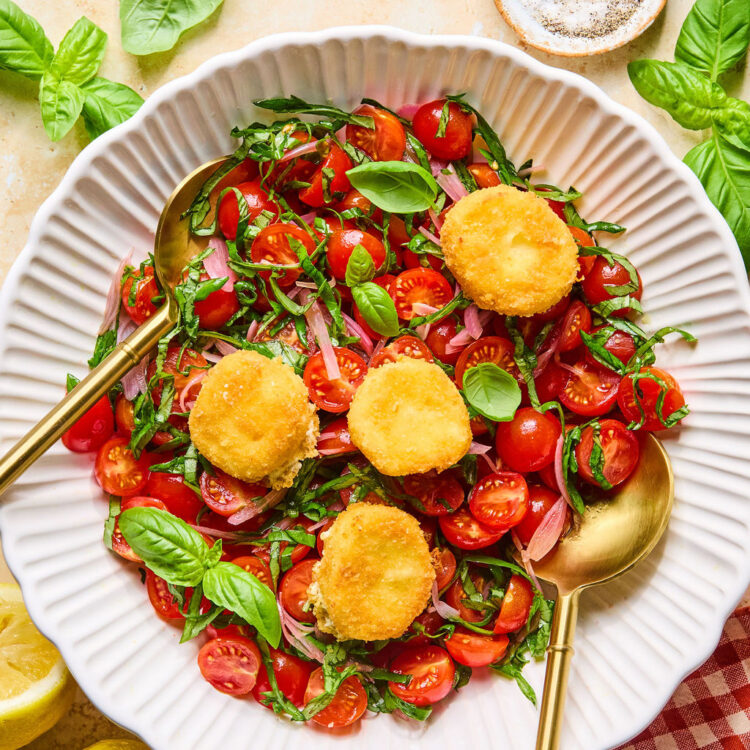 Crispy Goat Cheese & Tomato Salad in a bowl with a fork.
