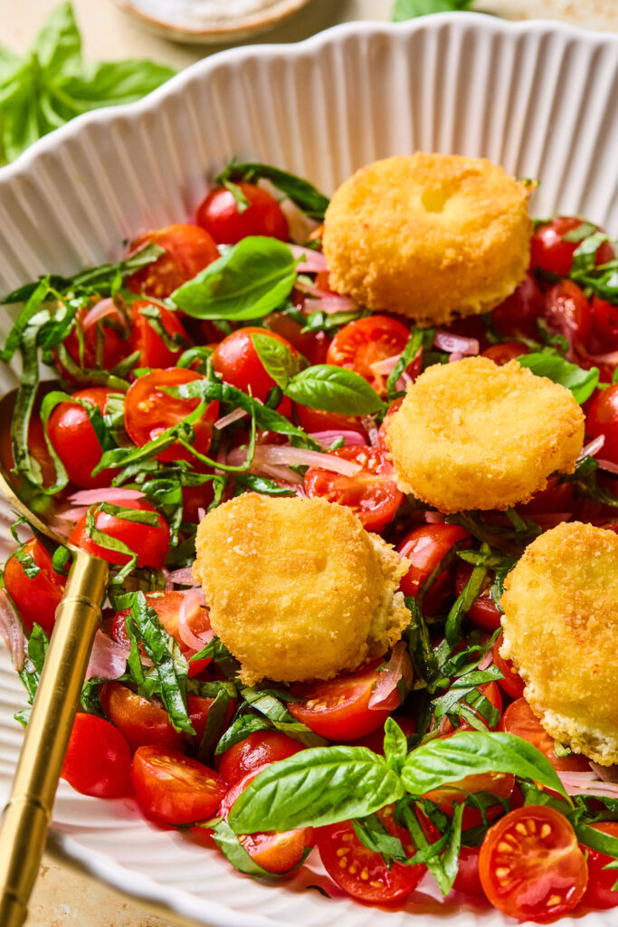 Zoomed in view of Crispy Goat Cheese & Tomato Salad.