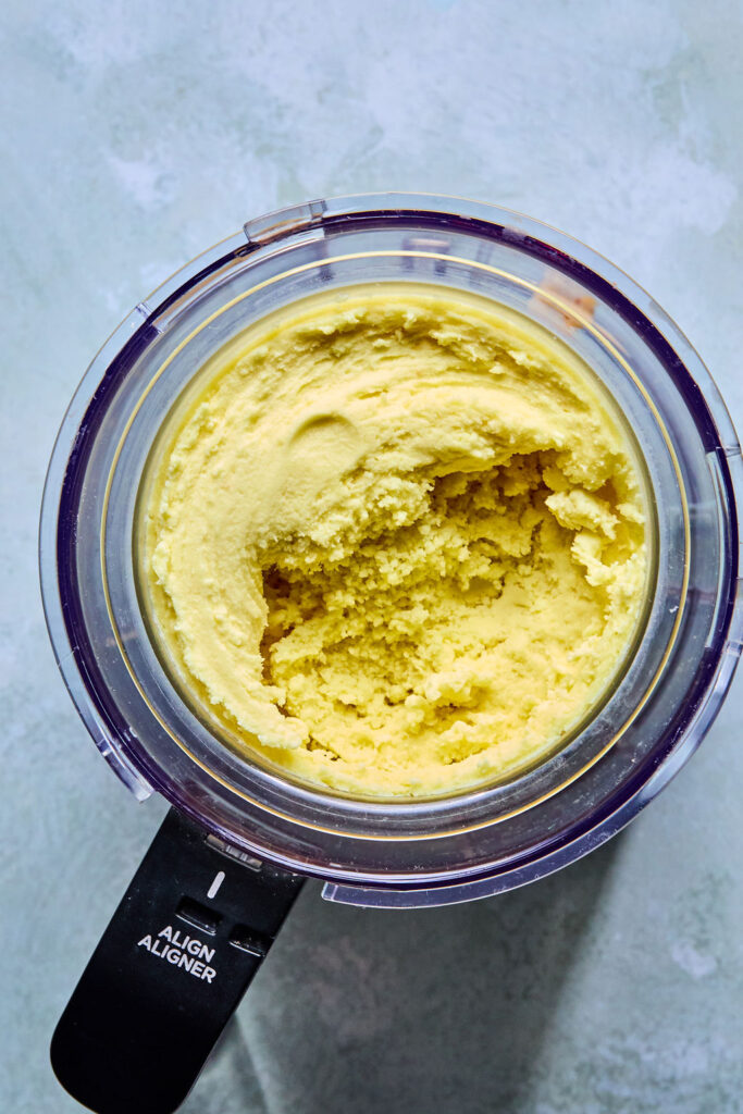 Ninja Creami Pineapple Sorbet in a Ninja creami pint.