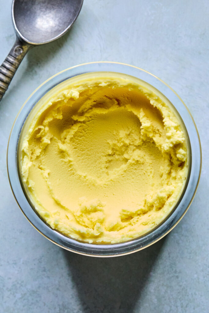 Ninja Creami Pineapple Sorbet in a Ninja creami pint.