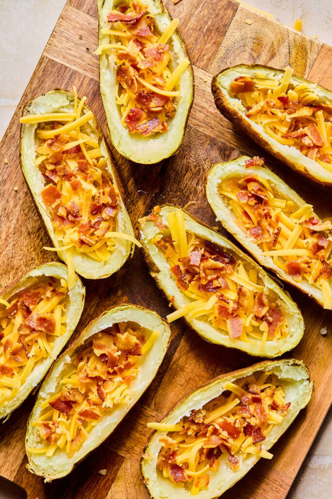 Air Fryer Potato Skins before on a cutting board before going in the air fryer.
