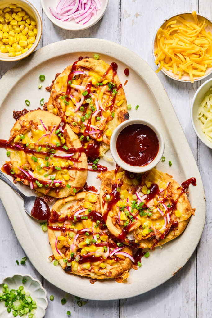 Sheet Pan BBQ Chicken Flatbread on a tray.