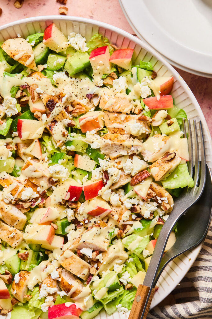 Zoomed in Honey Mustard Chicken Apple Salad with a fork.