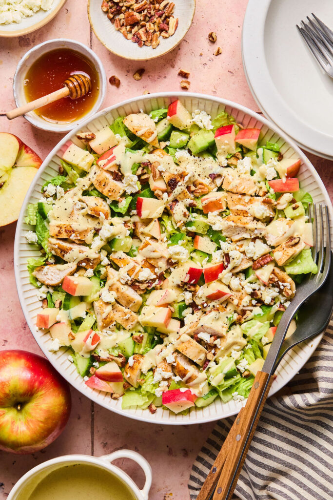Honey Mustard Chicken Apple Salad Bowls with a fork.