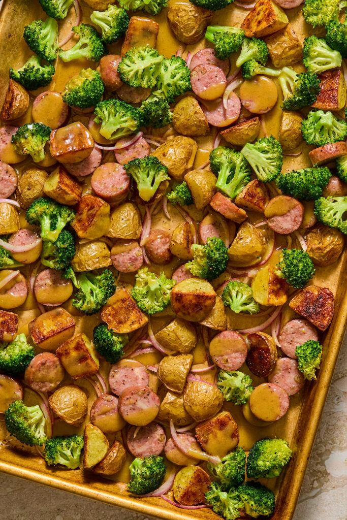Honey Mustard Chicken Sausage and Potato Sheet Pan on a baking sheet.
