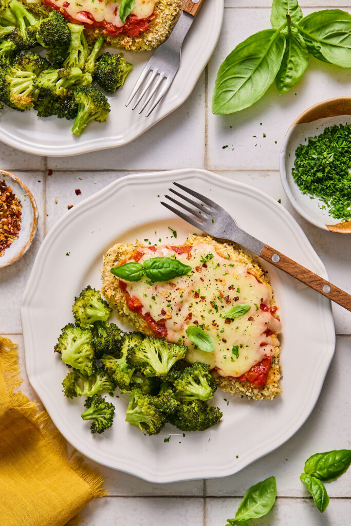 Sheet Pan Chicken Parmesan and Broccoli on a plate.