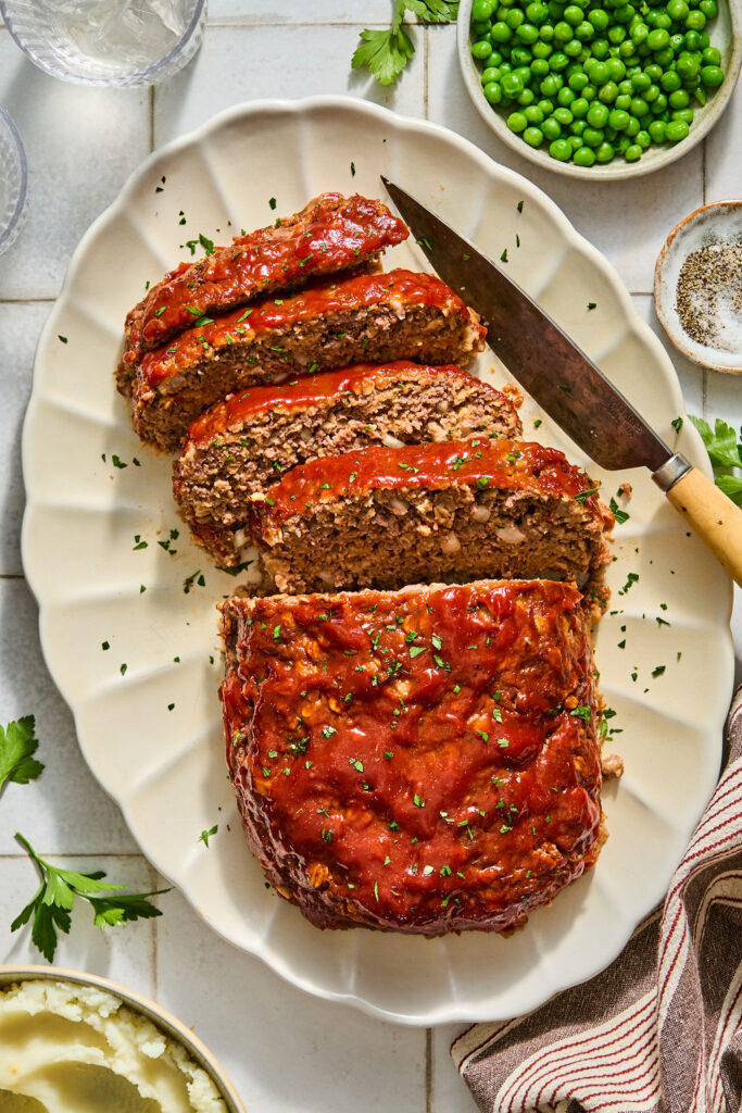 Meatloaf with Oats sliced on a plate.