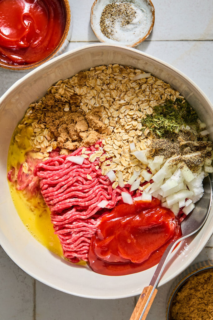 Ingredients for Meatloaf with Oats on a bowl before being combined.